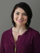 A headshot of Arial Moore