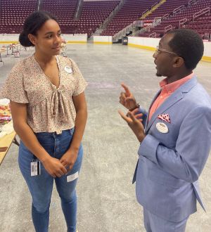 Donya Moore talks to Emmanuel Rupert at Hershey Park