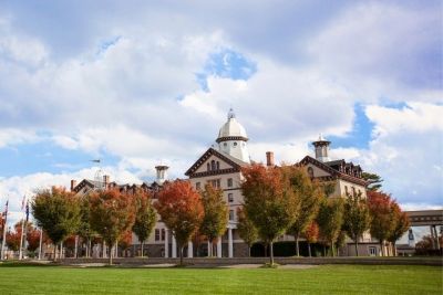 Old Main surrounded by fall foliage