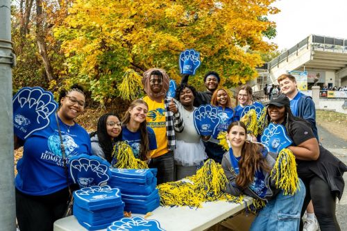 Students don Widener gear, pompoms, and Pride memorabilia at the 2024 Homecoming.